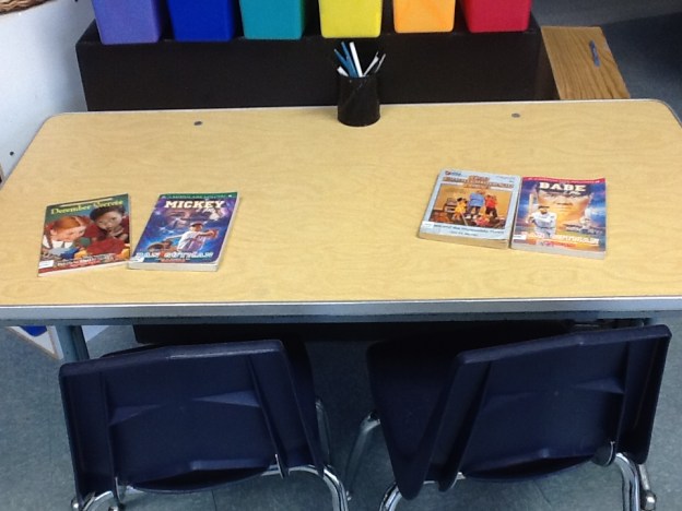 Tables started out like this, with two books at each seat.