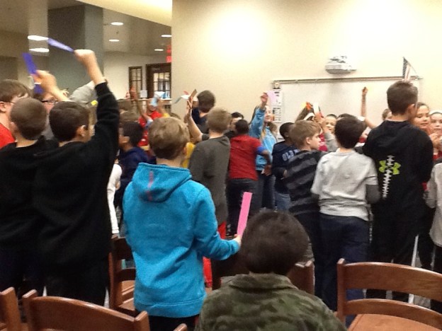 After the Q & A, they got into groups for the next activity--match your colored strip with the others to find your new group!