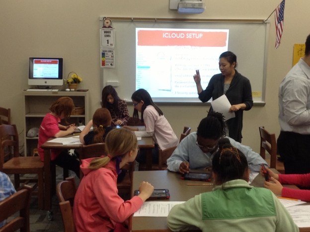 Mrs. Hong, another tech guru, leading us through iPad setup.  We luckily had a Keynote created for us to work through--made the whole thing a little clearer because it added a visual for those who needed it.