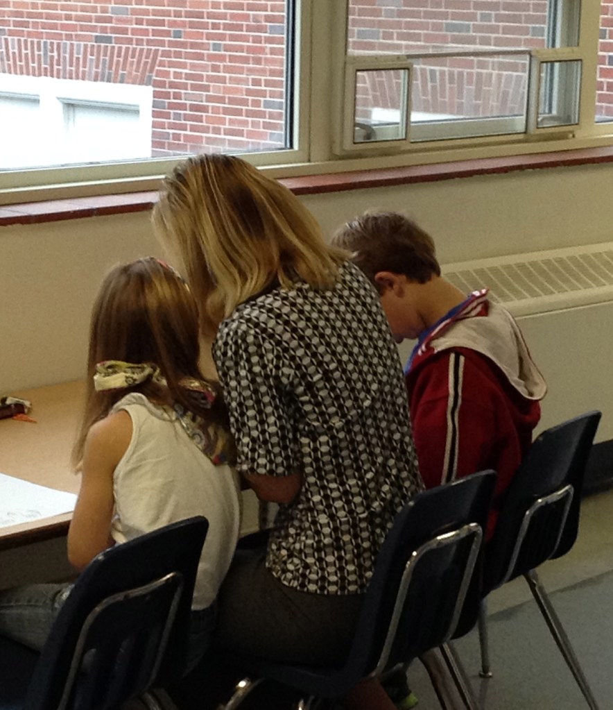 Lauren brought her brother and her mom to read together with her!
