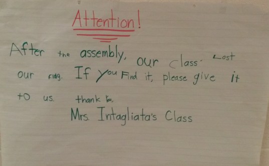 Kindergarten was using nonfiction in a really meaningful way!  They lost something important and needed help in finding it.  Update:  Their flag was found and returned to them!  I bet they're glad they asked for help!