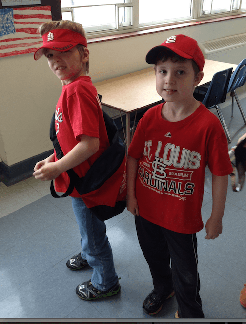 Those are some pretty awesome Cardinals' fans, aren't they?  Look, C.J.'s backpack even has Cardinal red on it!  Looking good, kiddos!